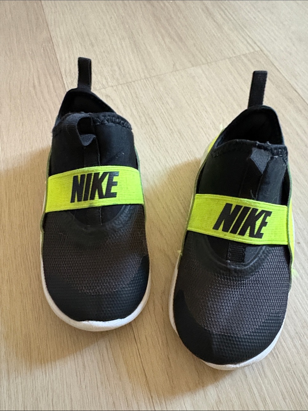 Nike Kids Black Slip-On Sneakers with Neon Yellow Strap